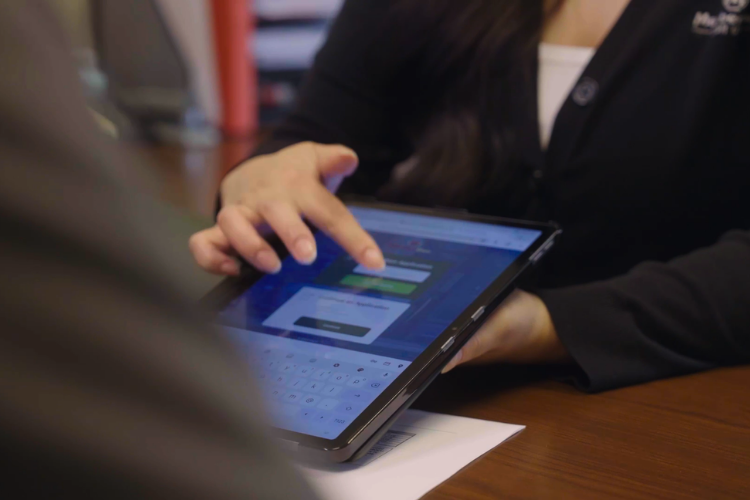 Staff going through online loan application