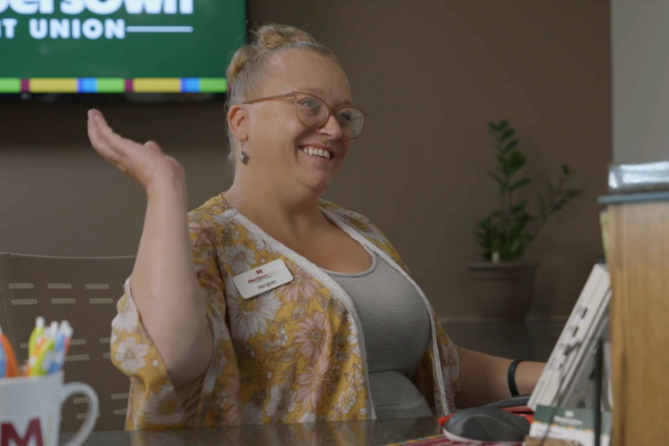 Member service representative waving