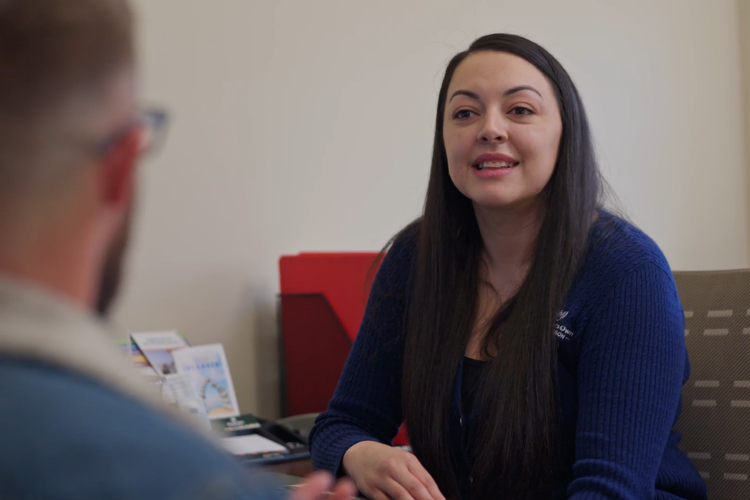 Lending specialist talking to member