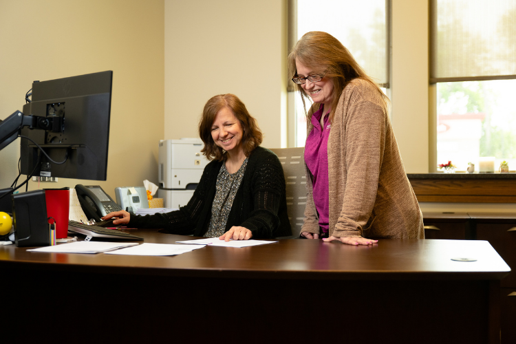 MOCU staff looking at paperwork